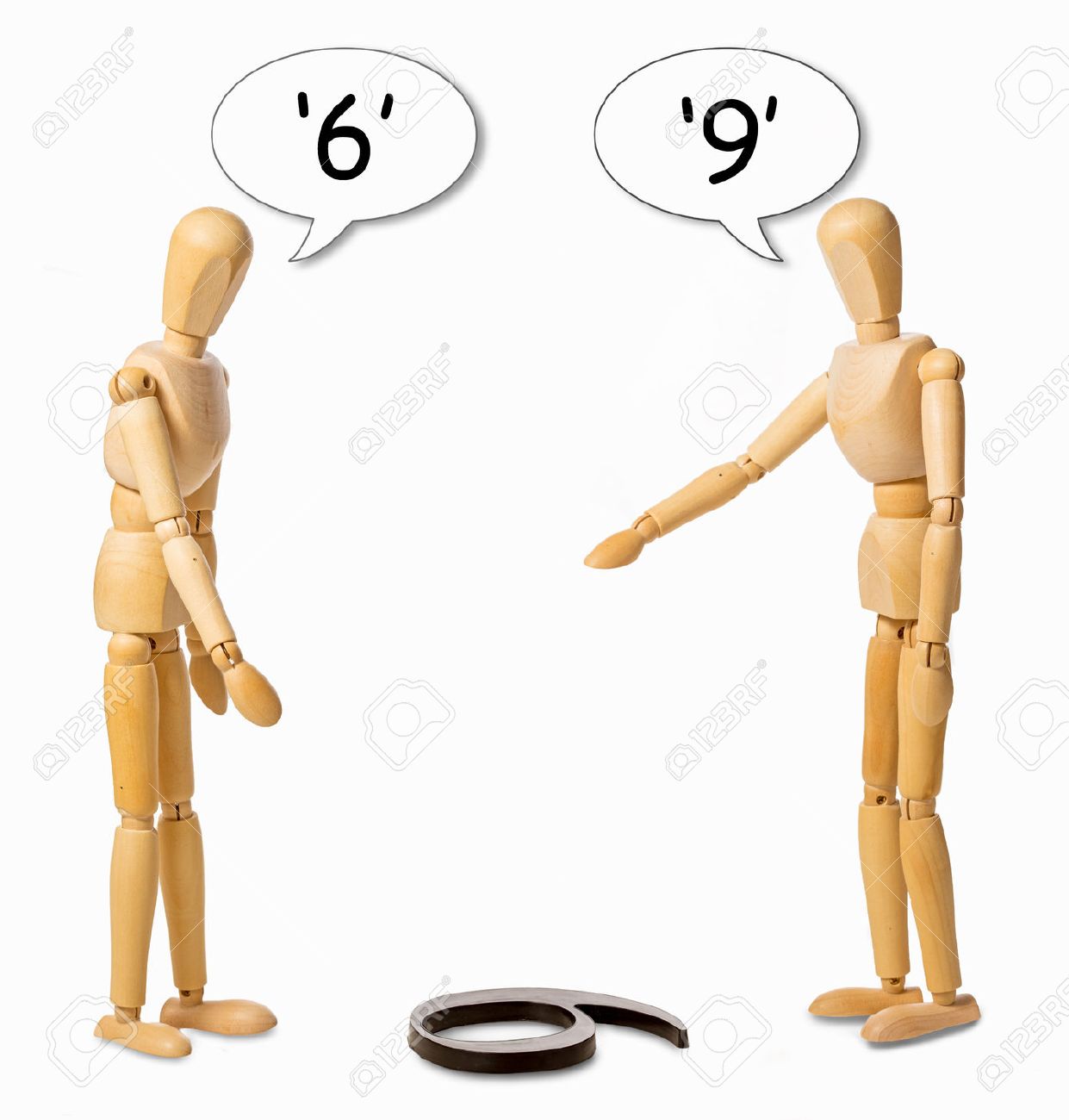 33890957-two-mannikins-arguing-whether-a-number-on-the-floor-is-a-6-or-a-9