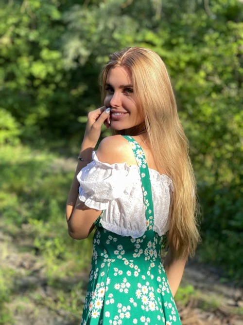 alina matsenko green and white dress