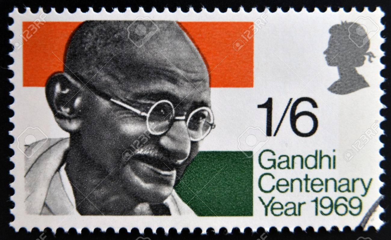 UNITED KINGDOM - CIRCA 1969: a stamp printed in Great Britain shows Mahatma Gandhi and flag of India, circa 1969